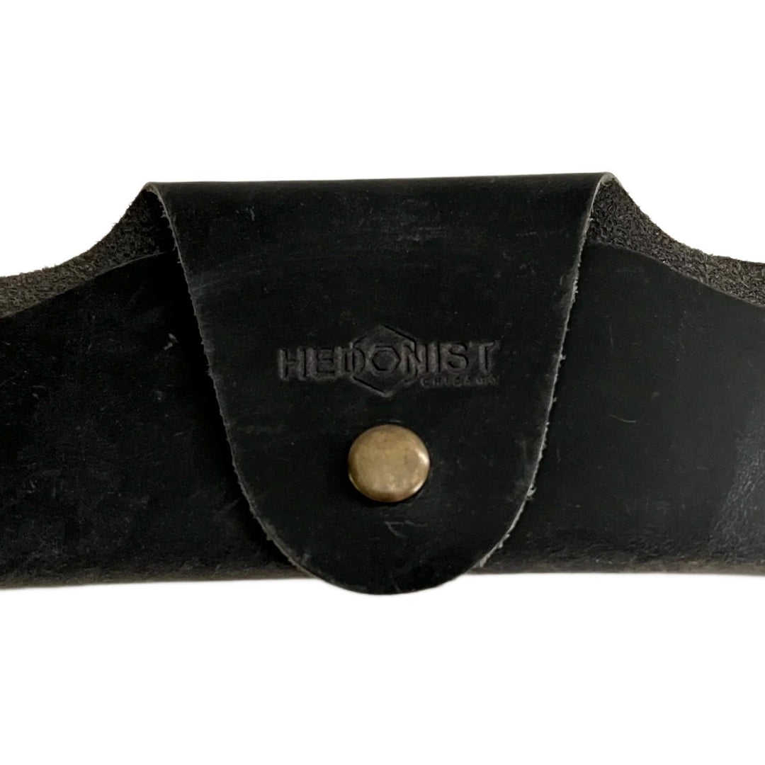 Small Soft Leather Eye Glasses Case in Black Washed, closed, front view with embossed Hedonist logo and snap closure