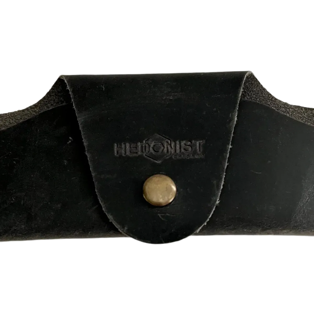 Small Soft Leather Eye Glasses Case in Black Washed, closed, front view with embossed Hedonist logo and snap closure