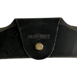 Small Soft Leather Eye Glasses Case in Black Washed, closed, front view with embossed Hedonist logo and snap closure