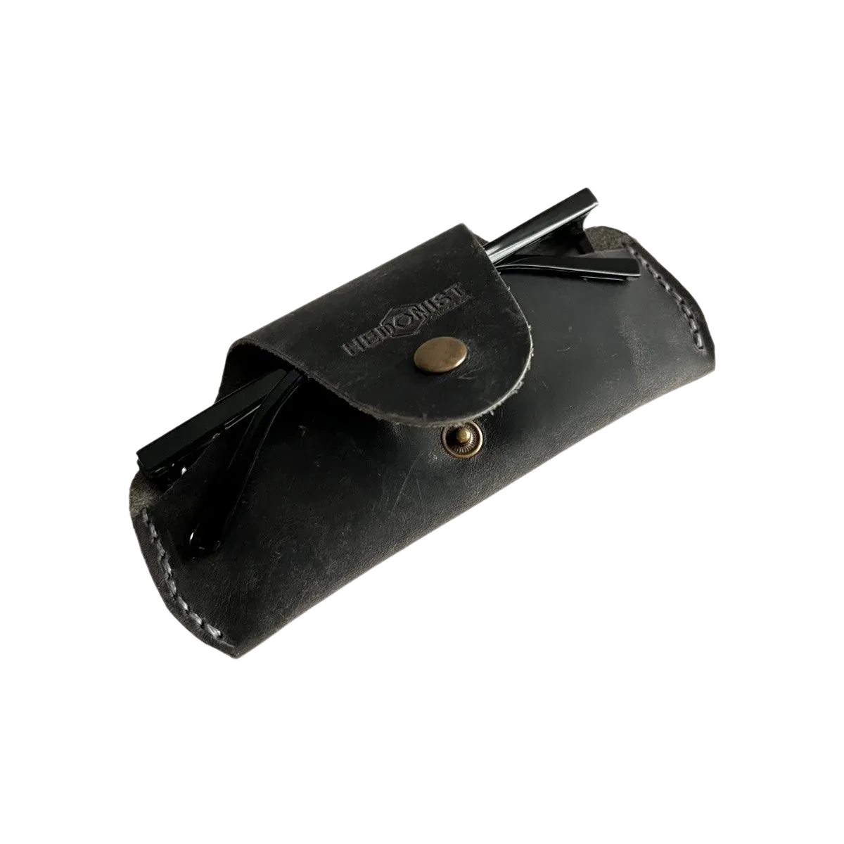 Small Soft Leather Eye Glasses Case in Black Washed, angled view with folded sunglasses tucked inside