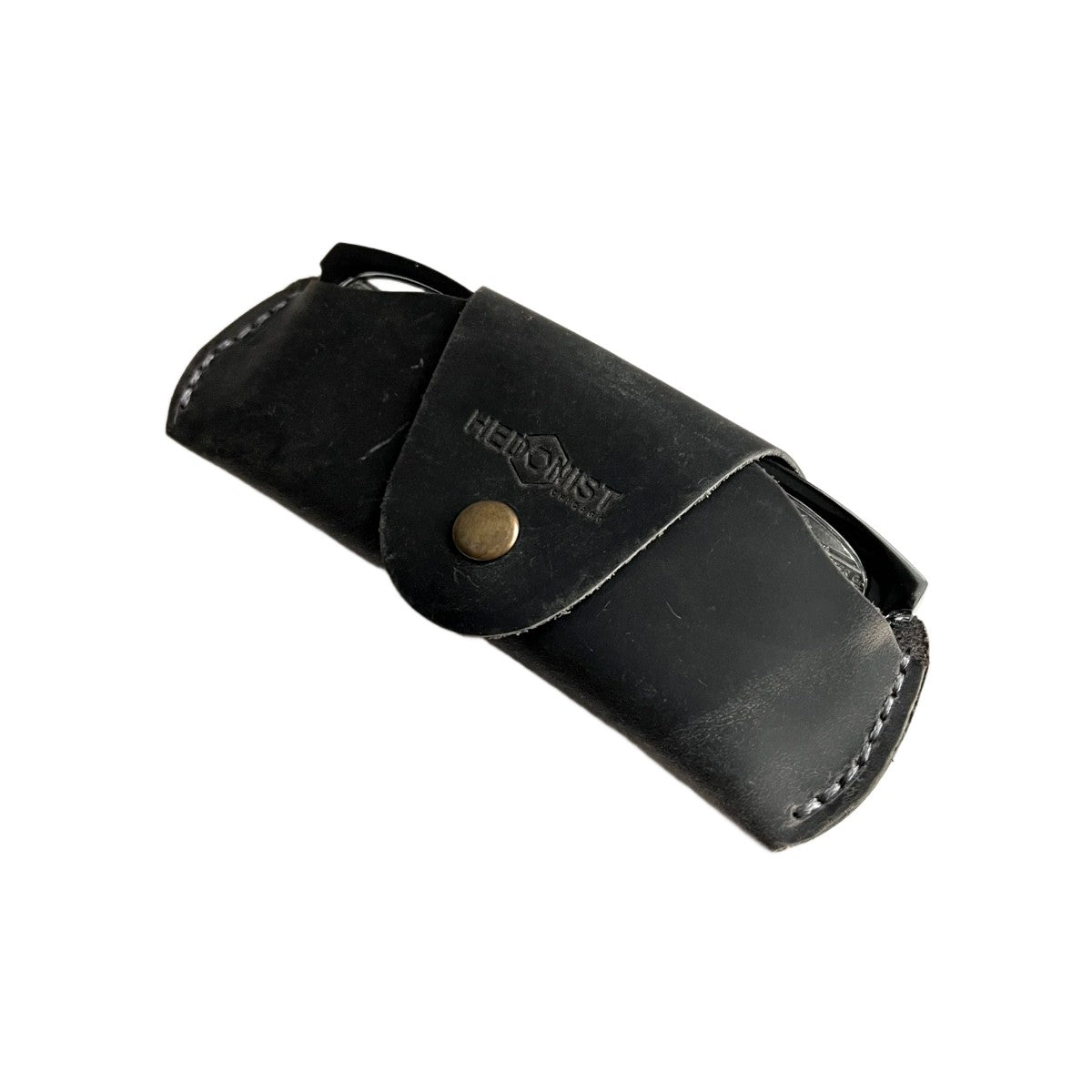 Small Soft Leather Eye Glasses Case in Black Washed, angled view with sunglasses temple visible