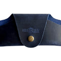 Small Soft Leather Eye Glasses Case in Navy Blue, closed, front view with embossed Hedonist logo and snap closure