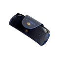 Small Soft Leather Eye Glasses Case in Navy Blue, angled view with black-framed eyeglasses tucked inside
