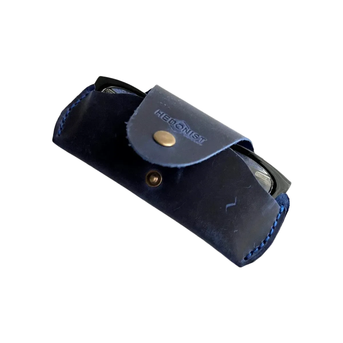 Small Soft Leather Eye Glasses Case in Navy Blue, angled view with black-framed eyeglasses tucked inside