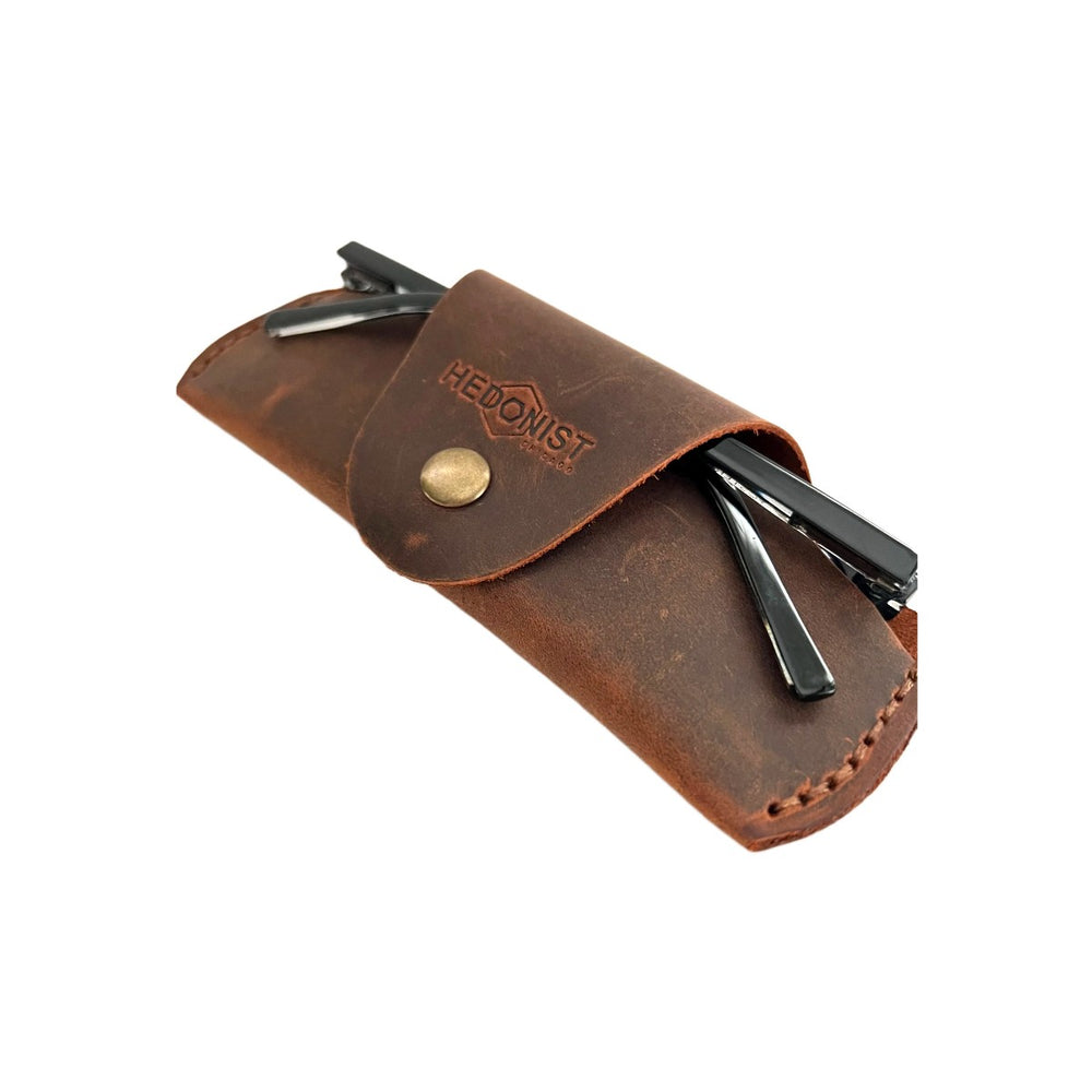 Small Soft Leather Eye Glasses Case in Brown, angled view with sunglasses temples visible poking out both sides