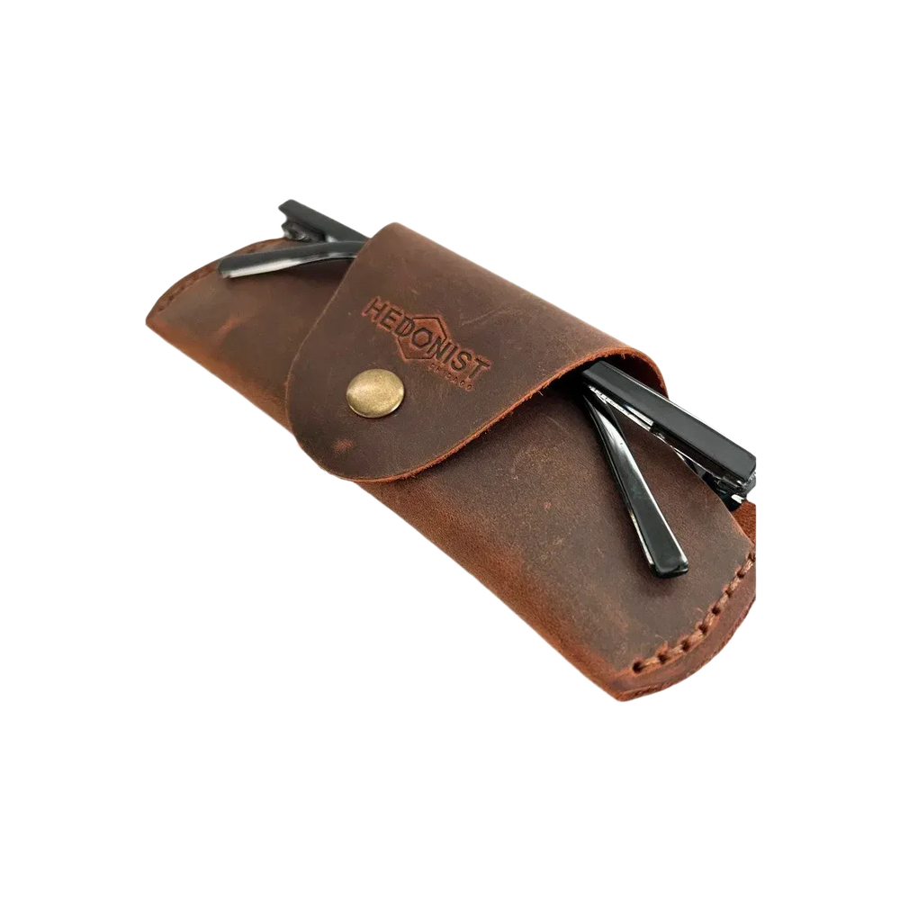 Small Soft Leather Eye Glasses Case in Brown, angled view with sunglasses temples visible poking out both sides
