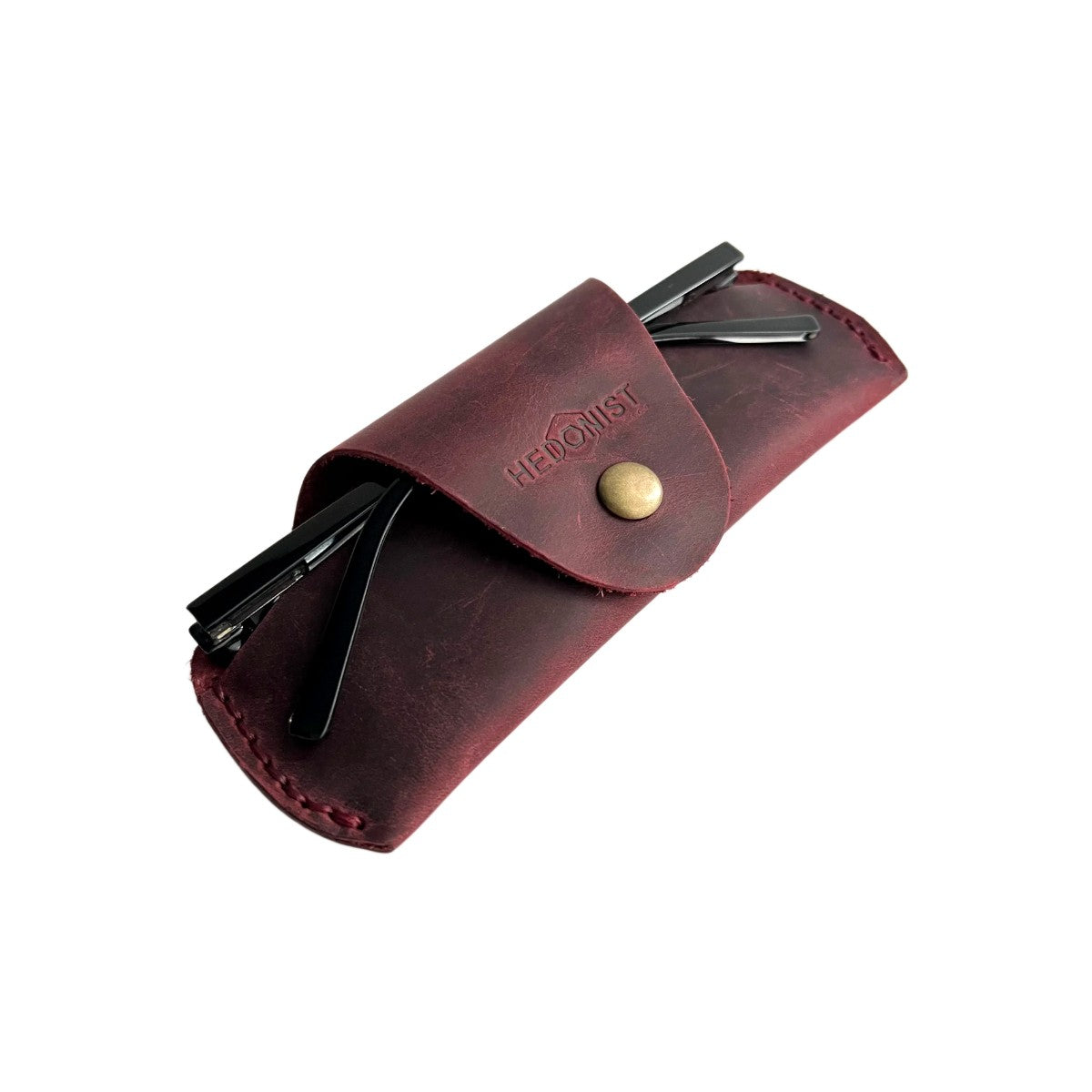 Small Soft Leather Eye Glasses Case in Burgundy, angled view with sunglasses temples visible poking out both sides