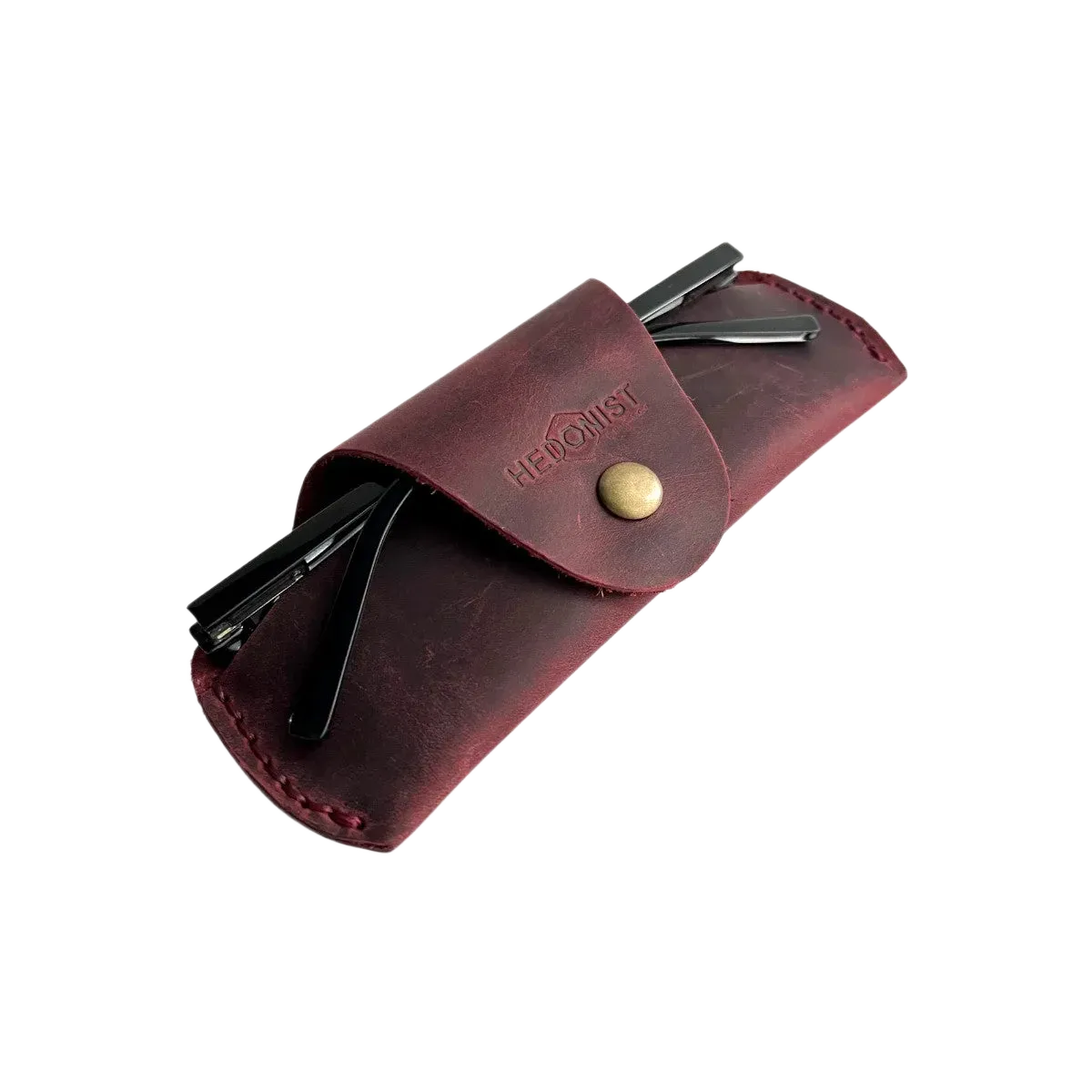 Small Soft Leather Eye Glasses Case in Burgundy, angled view with sunglasses temples visible poking out both sides