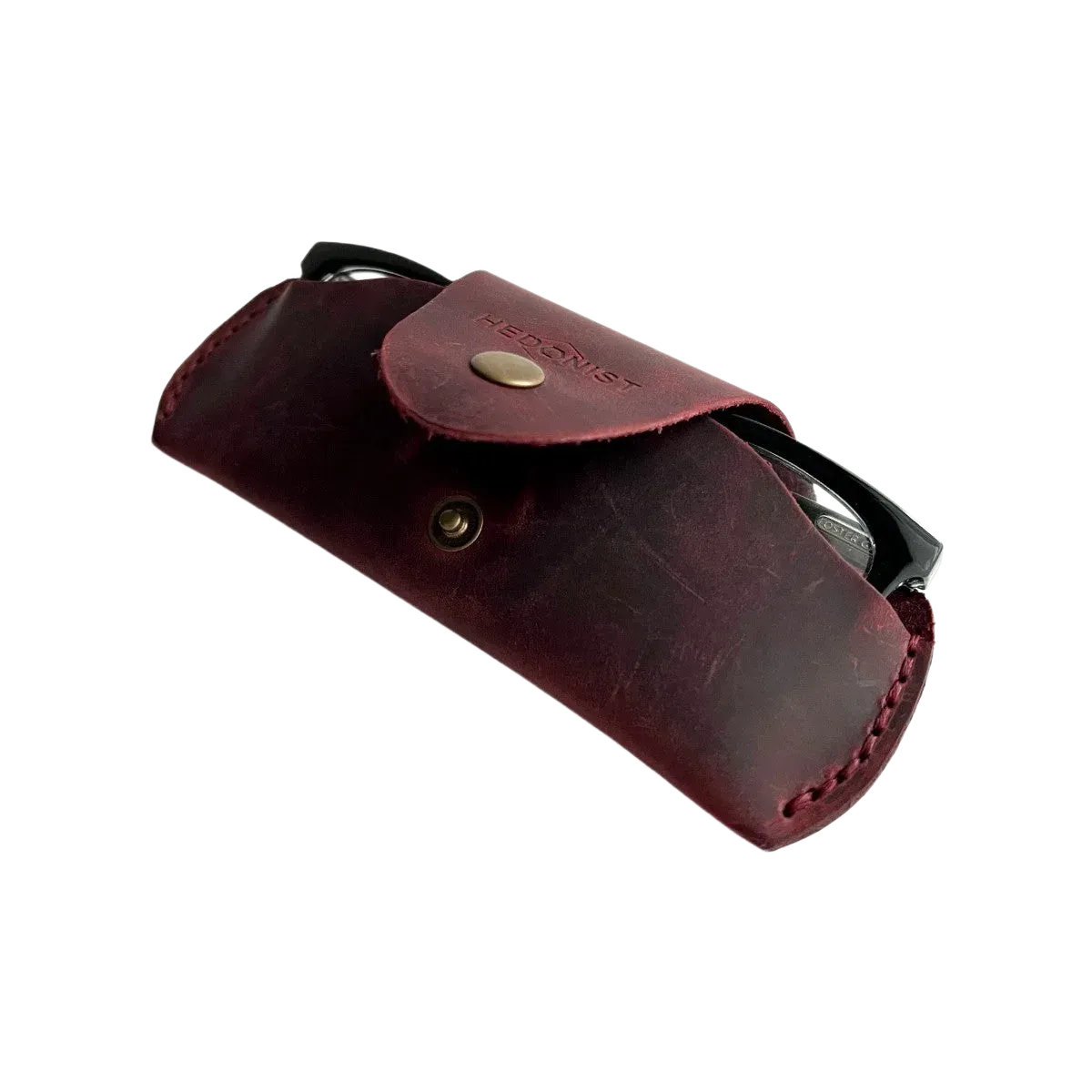 Small Soft Leather Eye Glasses Case in Burgundy, open, angled top view with black-framed eyeglasses inside