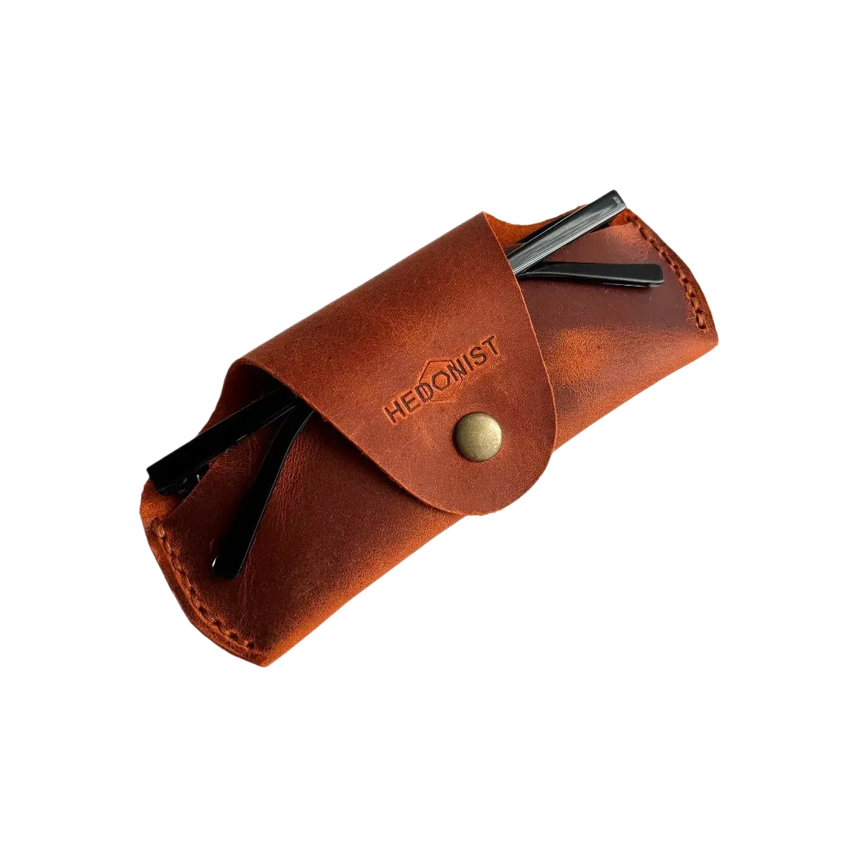 Small Soft Leather Eye Glasses Case in Cognac with folded sunglasses tucked inside, temples visible