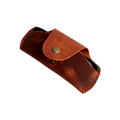 Small Soft Leather Eye Glasses Case in Cognac, angled view with folded sunglasses peeking out