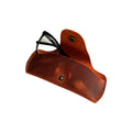 Small Soft Leather Eye Glasses Case in Cognac, open, with black-framed eyeglasses inside