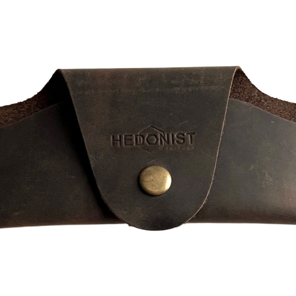 Small Soft Leather Eye Glasses Case in Dark Brown, closed, front view with embossed Hedonist logo and snap closure