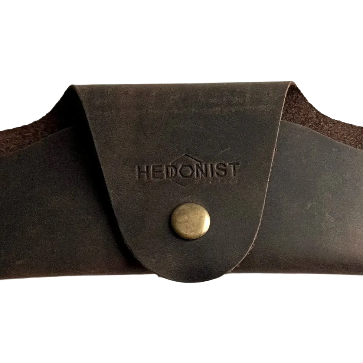Small Soft Leather Eye Glasses Case in Dark Brown, closed, front view with embossed Hedonist logo and snap closure