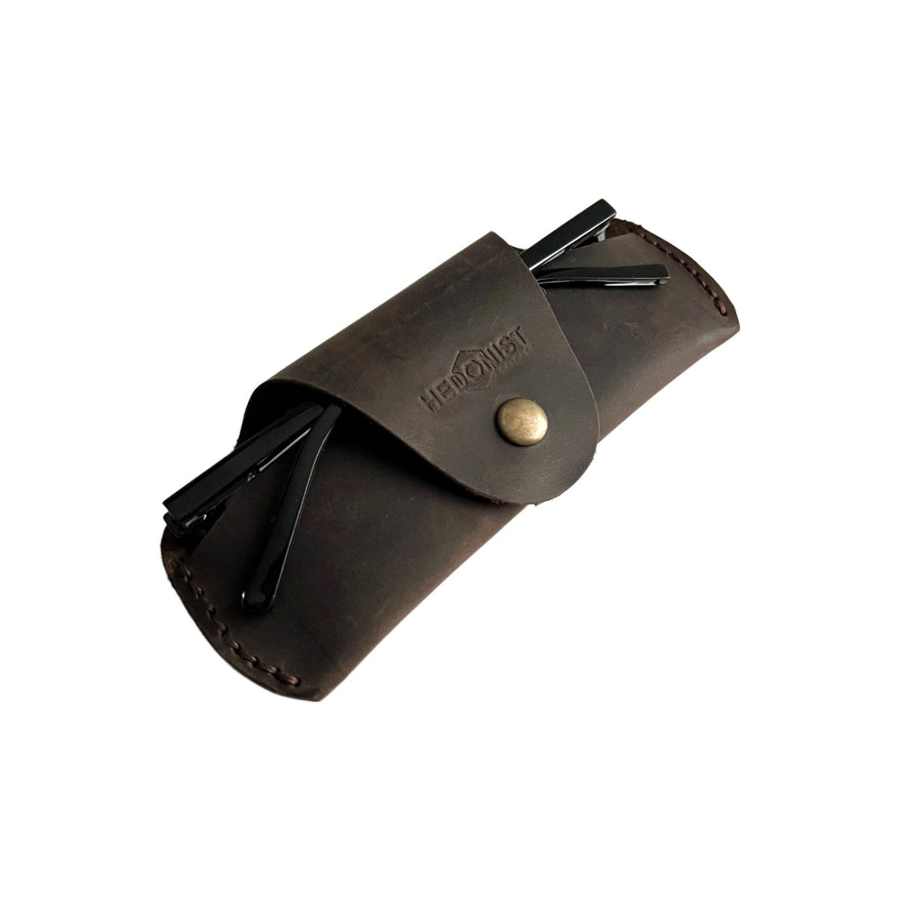 Small Soft Leather Eye Glasses Case in Dark Brown, angled view with folded sunglasses tucked inside