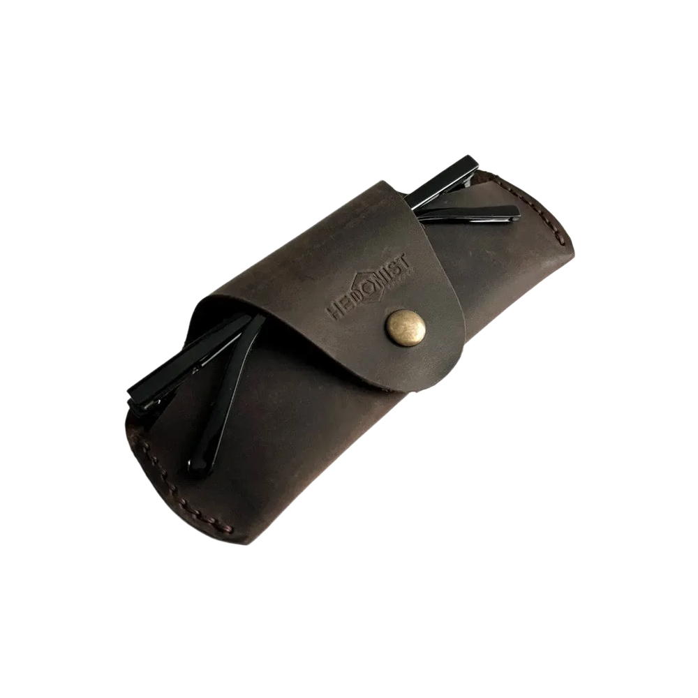 Small Soft Leather Eye Glasses Case in Dark Brown, angled view with folded sunglasses tucked inside