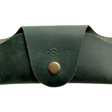 Small Soft Leather Eye Glasses Case in Dark Green, closed, front view with embossed Hedonist logo and snap closure