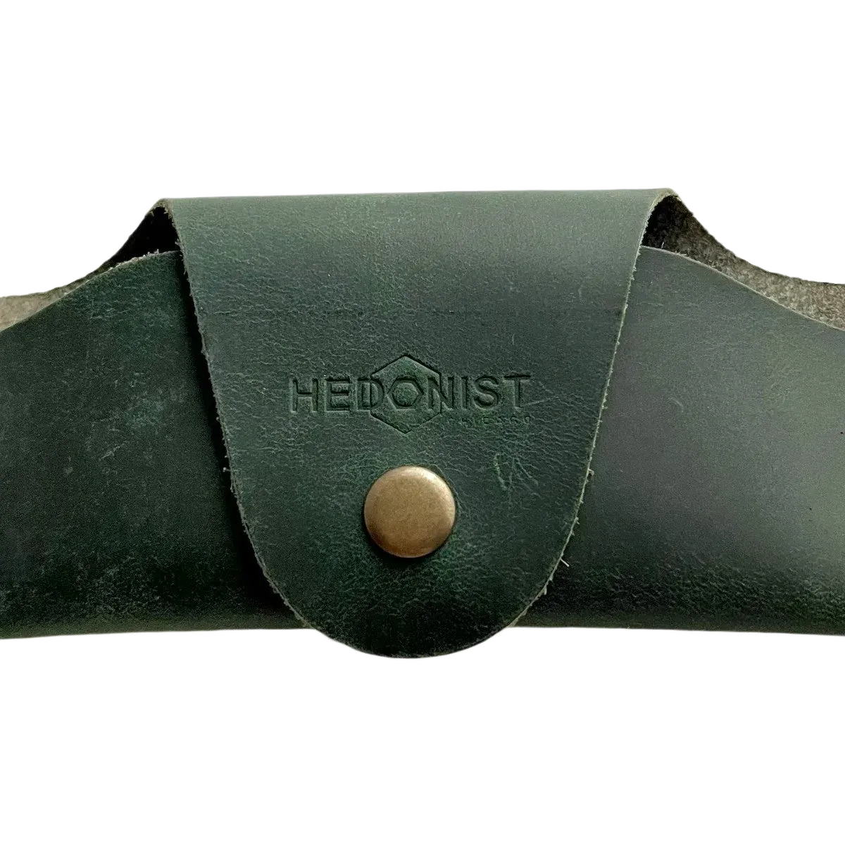 Small Soft Leather Eye Glasses Case in Dark Green, closed, front view with embossed Hedonist logo and snap closure