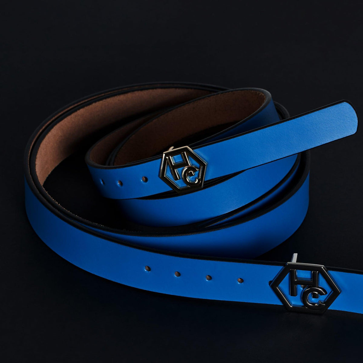 Side view on women's seamless edge leather belt - sky blue - Hedonist Chicago - close-up view (1.3")