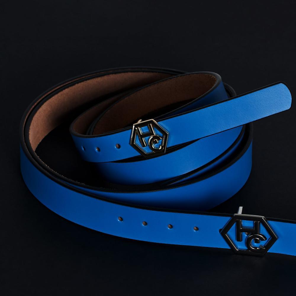 Side view on women's seamless edge leather belt - sky blue - Hedonist Chicago - close-up view (1")