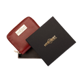 Small red zip-around leather wallet for women, presented as a gift