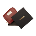 Small red zip-around leather wallet for women, presented as a gift