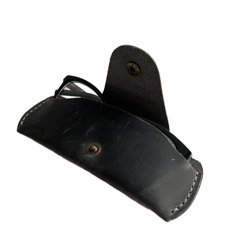 Small Soft Leather Eye Glasses Case in Black Washed, open, angled top view with sunglasses inside
