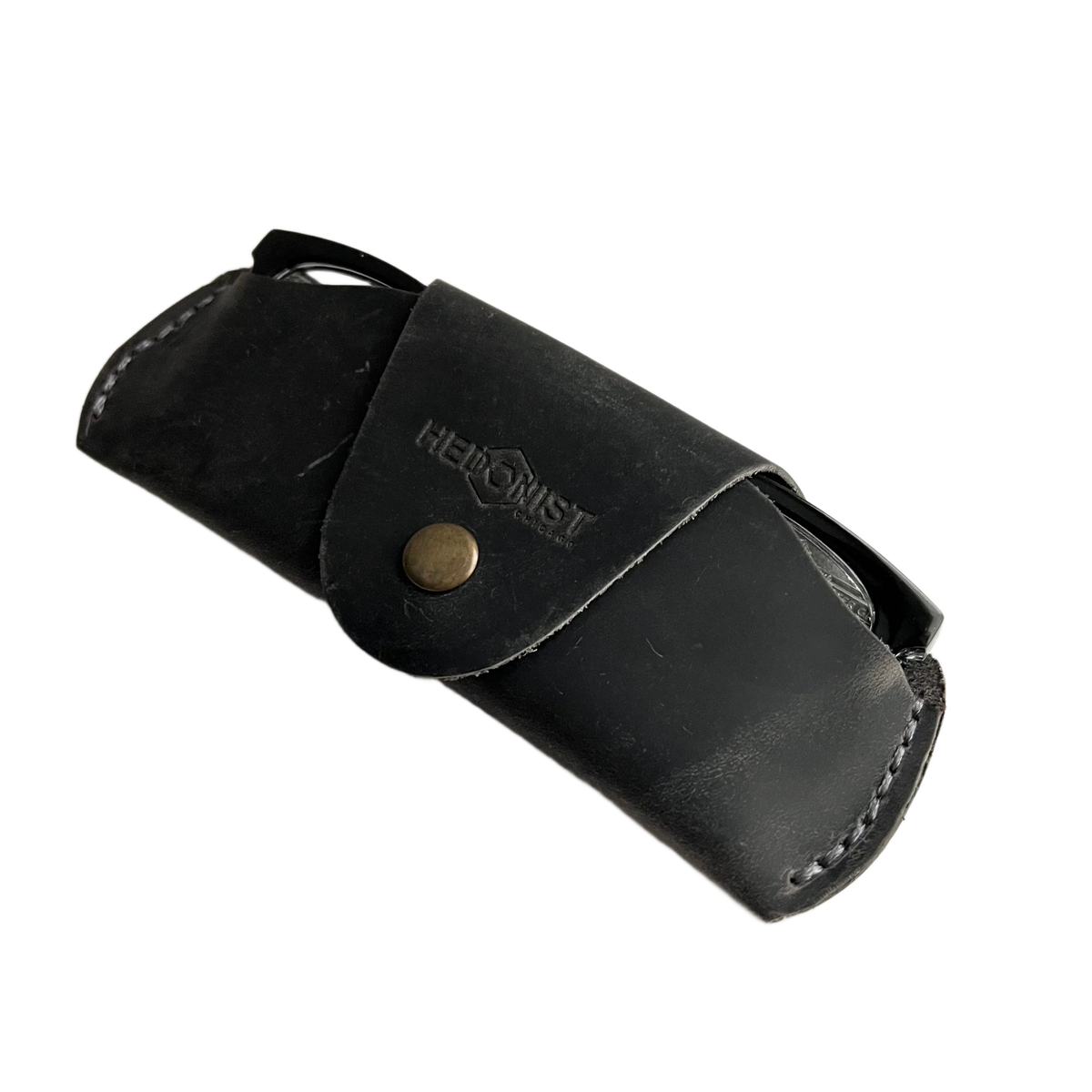 Small Soft Leather Eye Glasses Case in Black Washed, angled view with sunglasses temple visible