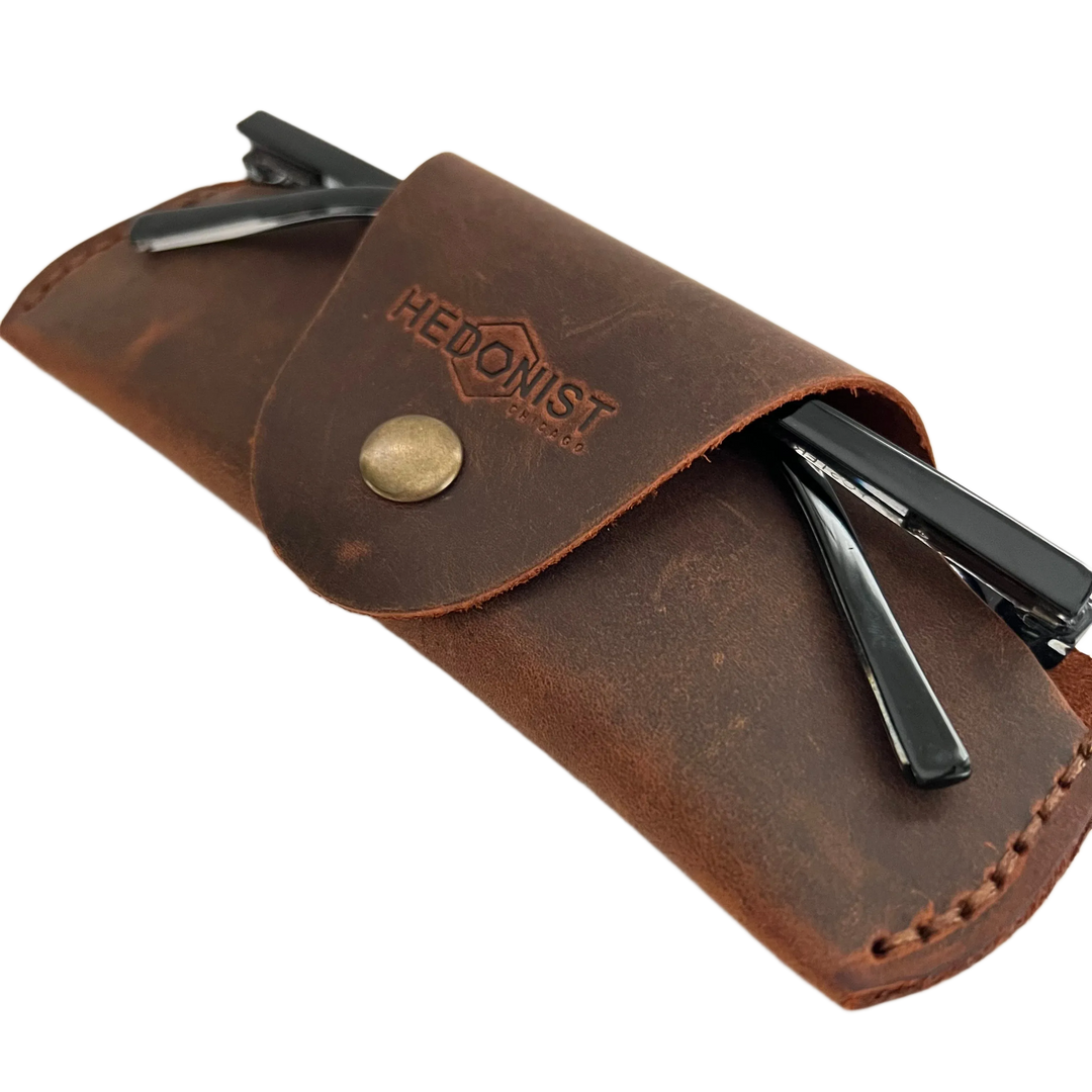 Small Soft Leather Eye Glasses Case in Brown, angled view with sunglasses temples visible poking out both sides