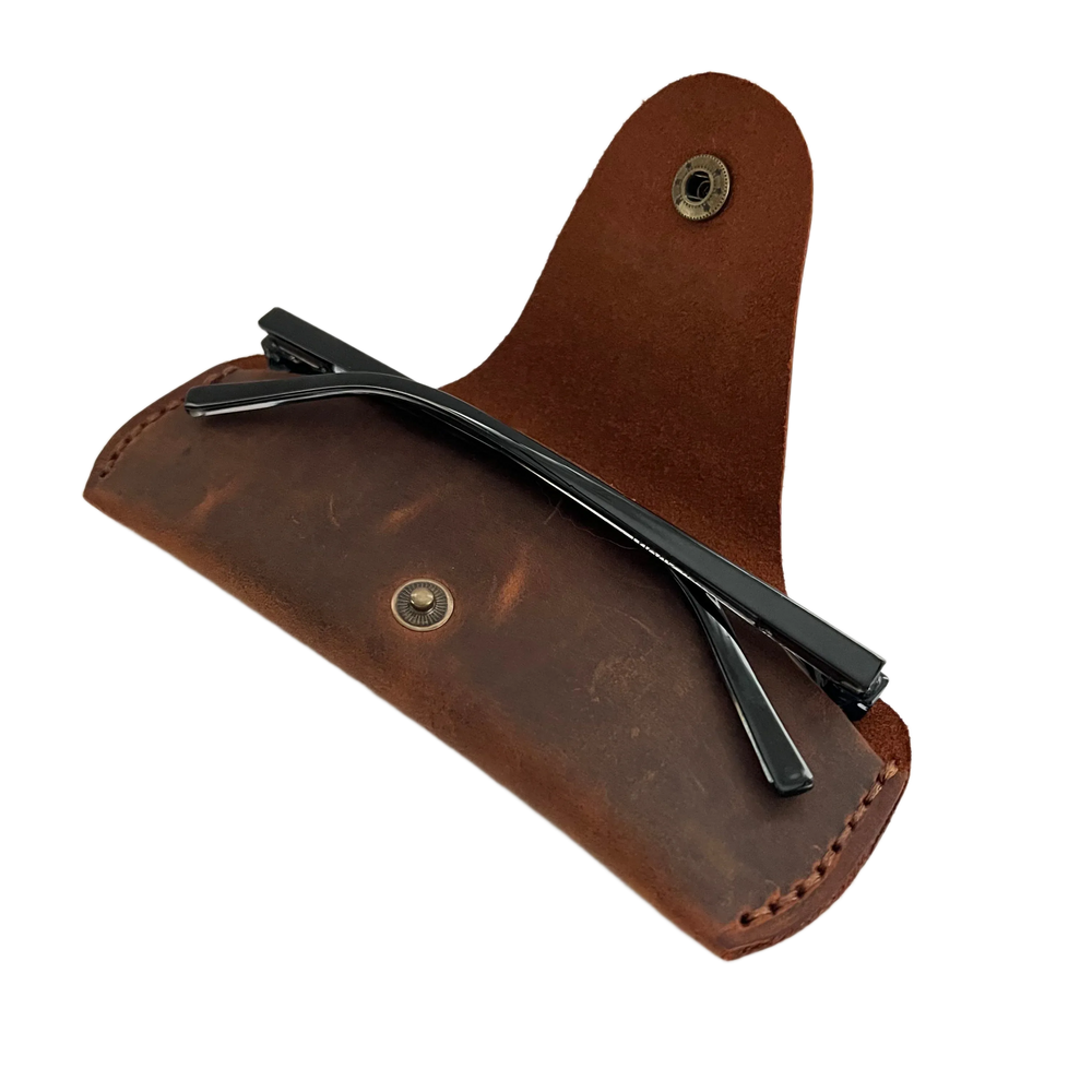 Small Soft Leather Eye Glasses Case in Brown, open, angled top view with folded sunglasses inside