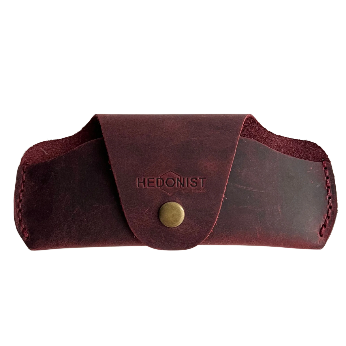 Small Soft Leather Eye Glasses Case in Burgundy, closed, front view with embossed Hedonist logo and snap closure