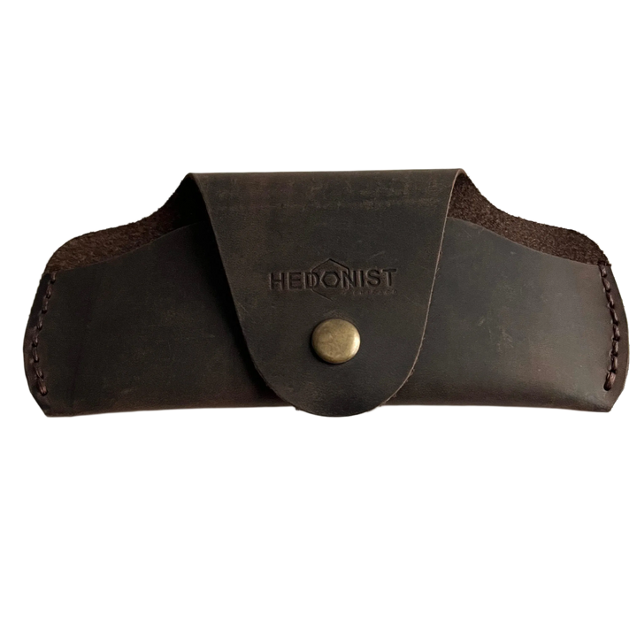 Small Soft Leather Eye Glasses Case in Dark Brown, closed, front view with embossed Hedonist logo and snap closure