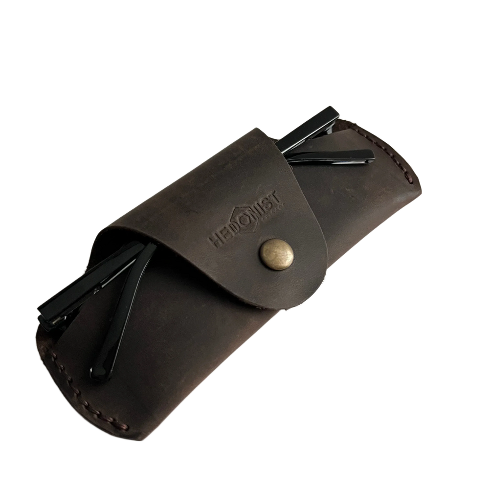 Small Soft Leather Eye Glasses Case in Dark Brown, angled view with folded sunglasses tucked inside