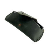 Small Soft Leather Eye Glasses Case in Dark Green, open, angled top view with black-framed eyeglasses inside