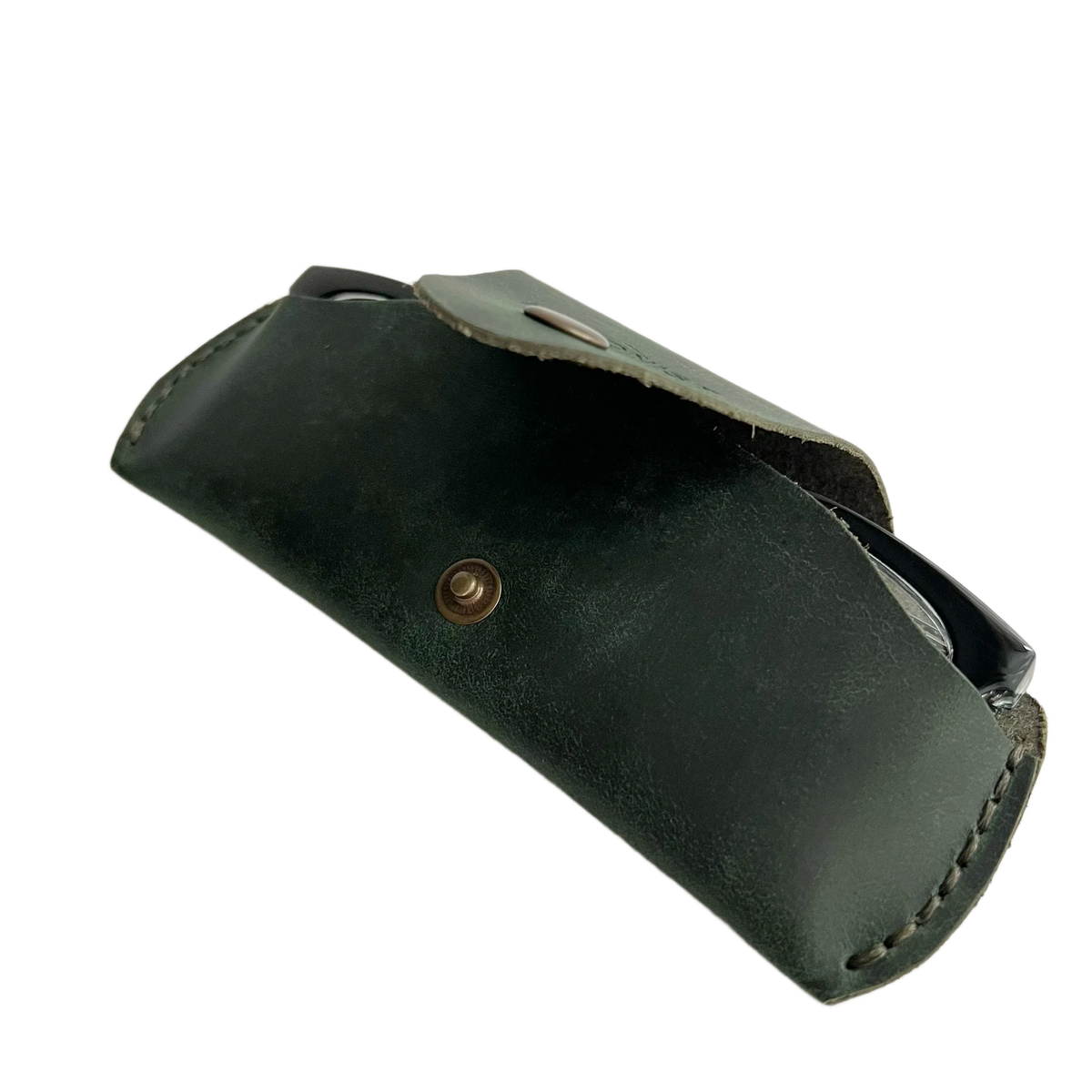 Small Soft Leather Eye Glasses Case in Dark Green, open, angled top view with black-framed eyeglasses inside