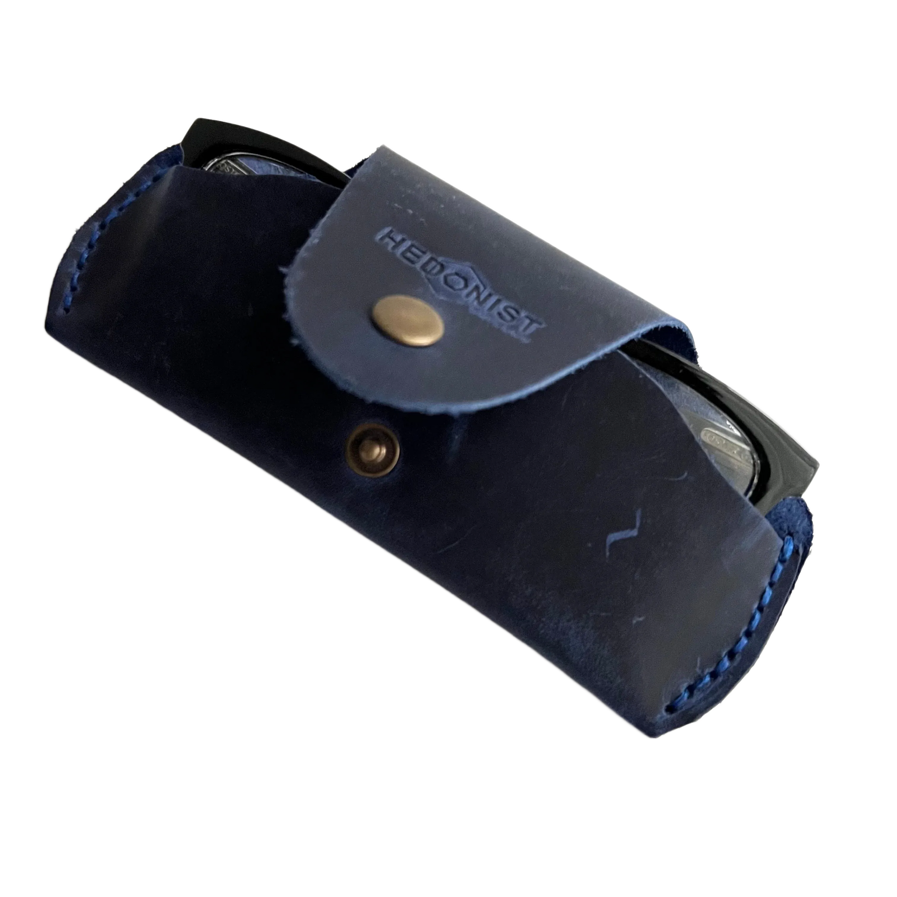 Small Soft Leather Eye Glasses Case in Navy Blue, angled view with black-framed eyeglasses tucked inside