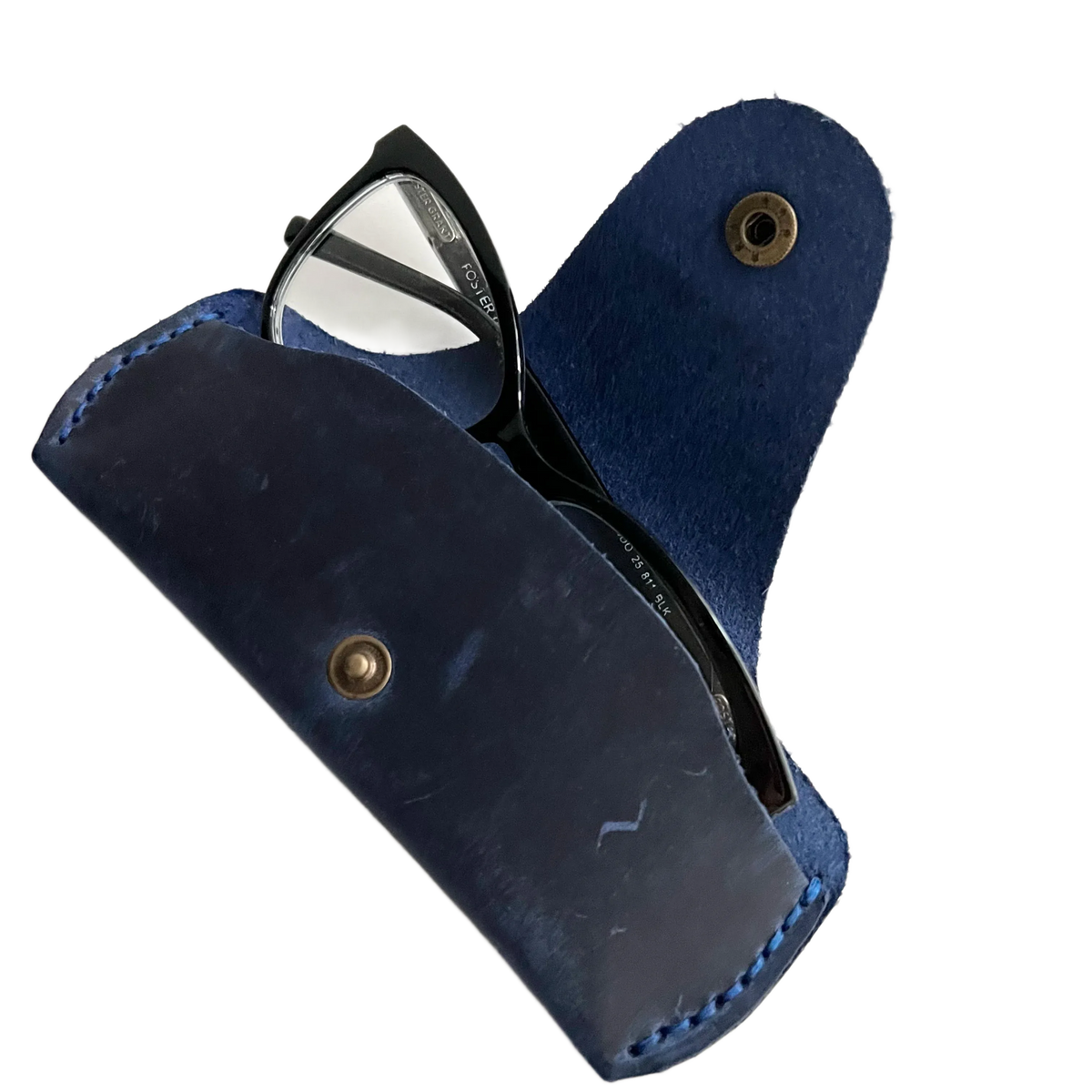Small Soft Leather Eye Glasses Case in Navy Blue, open, angled top view with black-framed eyeglasses inside