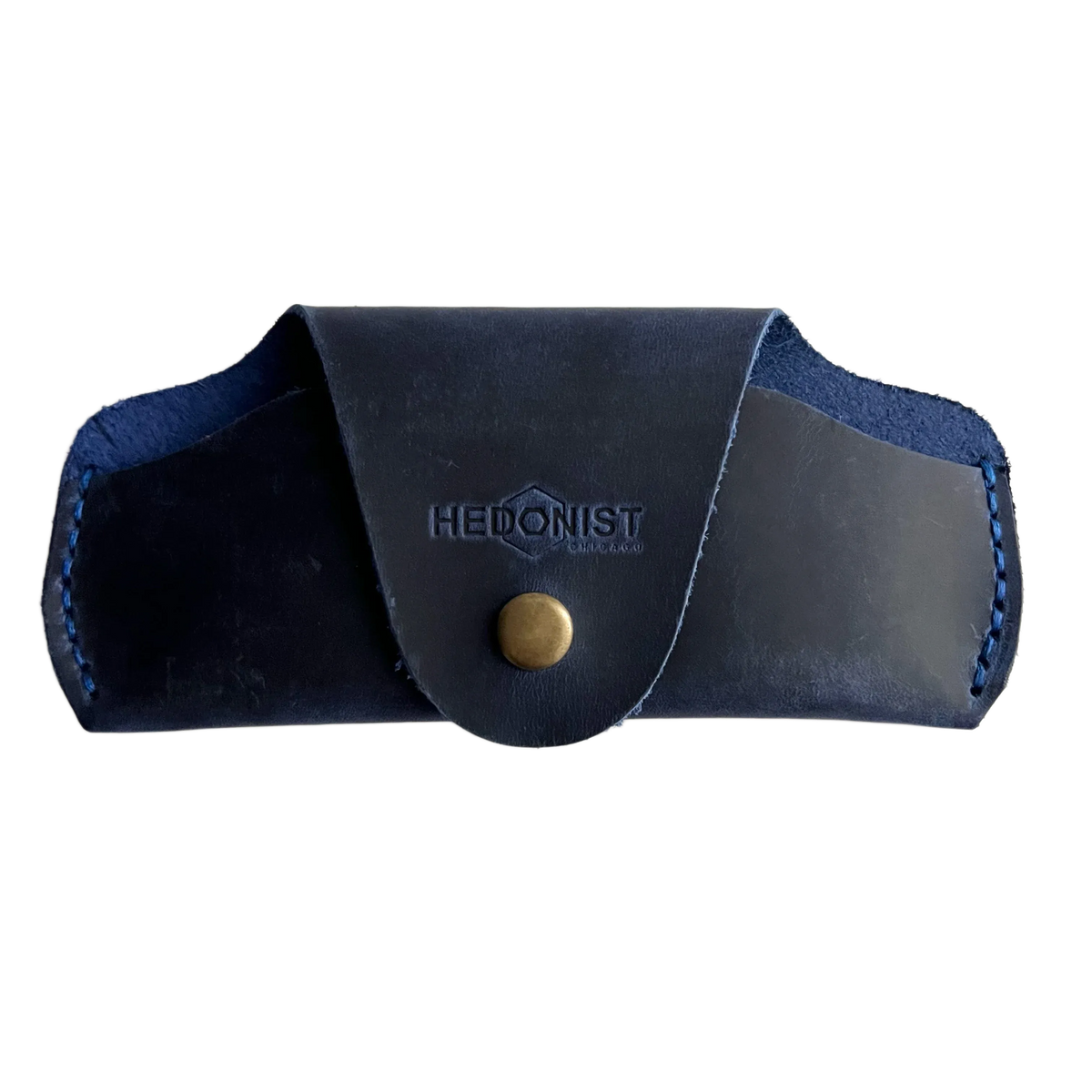 Small Soft Leather Eye Glasses Case in Navy Blue, closed, front view with embossed Hedonist logo and snap closure