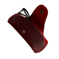 Small Soft Leather Eye Glasses Case in Red, open, angled top view with black-framed eyeglasses inside