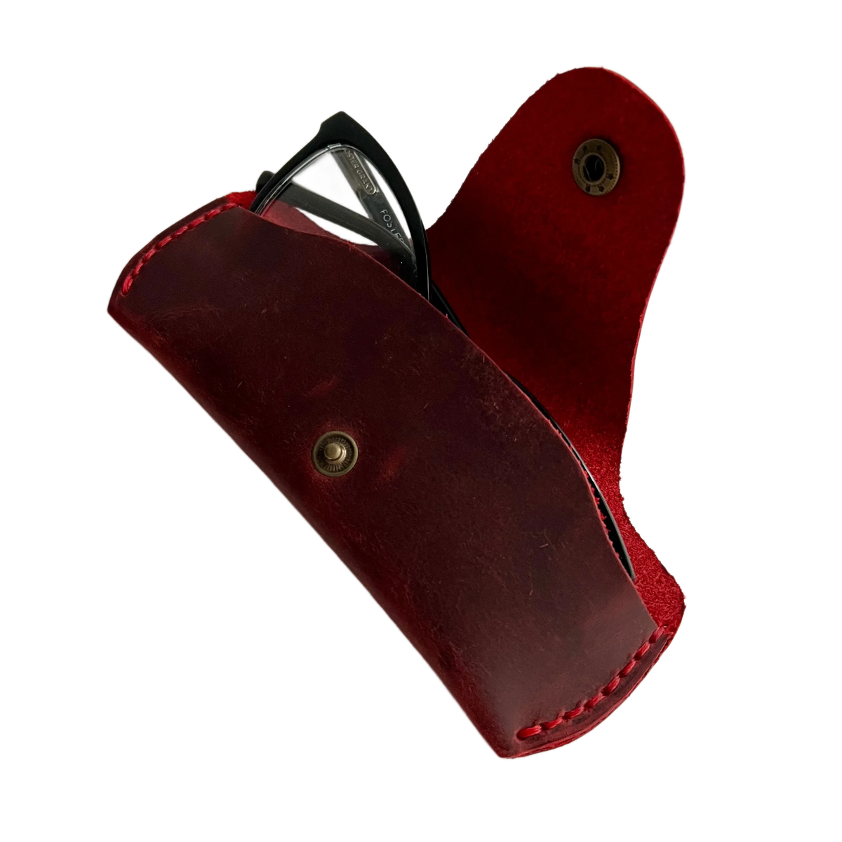 Small Soft Leather Eye Glasses Case in Red, open, angled top view with black-framed eyeglasses inside
