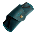 Small Soft Leather Eye Glasses Case in Teal, angled view with sunglasses temples visible poking out