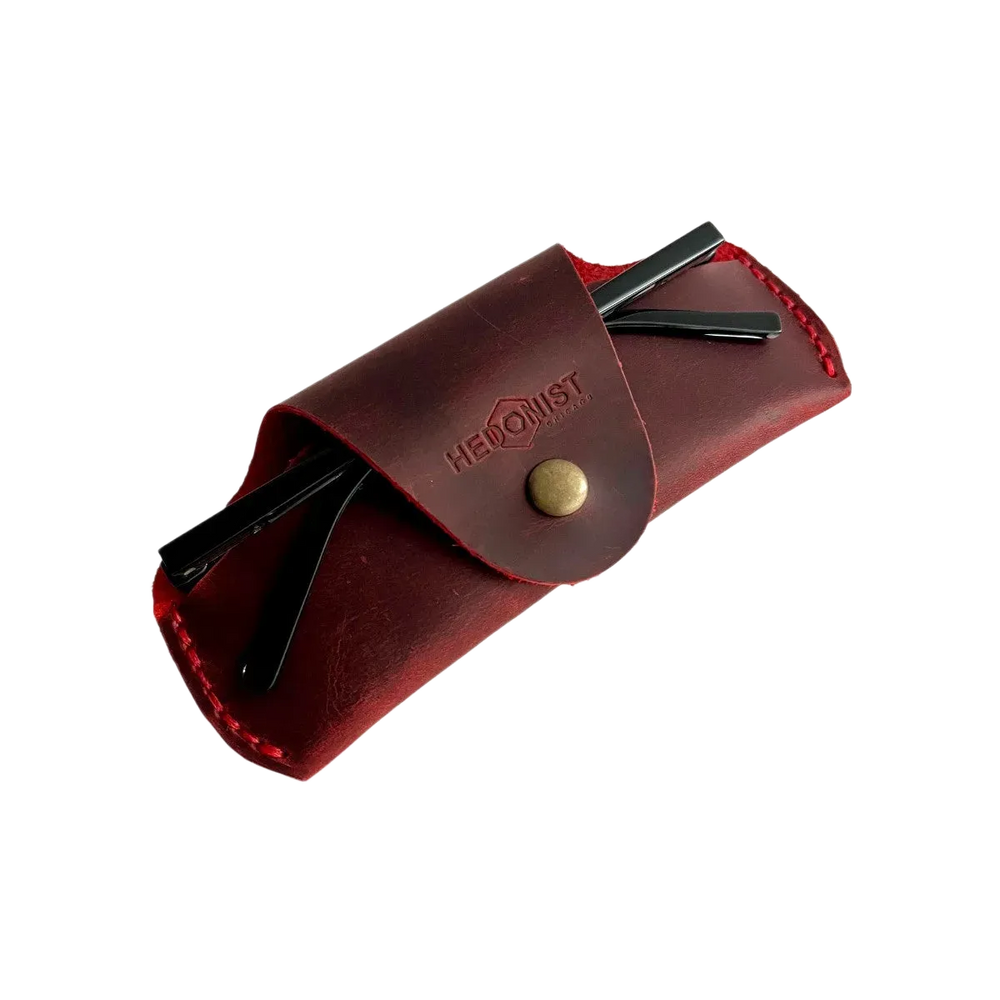 Small Soft Leather Eye Glasses Case in Red, angled view with sunglasses temples visible poking out