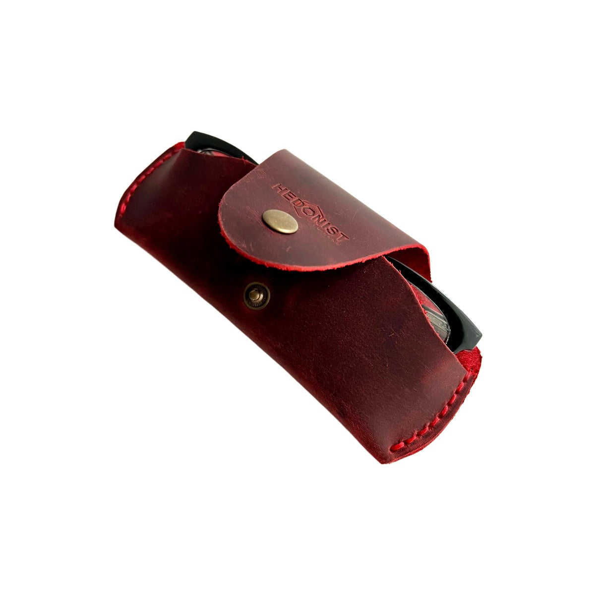 Small Soft Leather Eye Glasses Case in Red, angled view with black-framed eyeglasses tucked inside