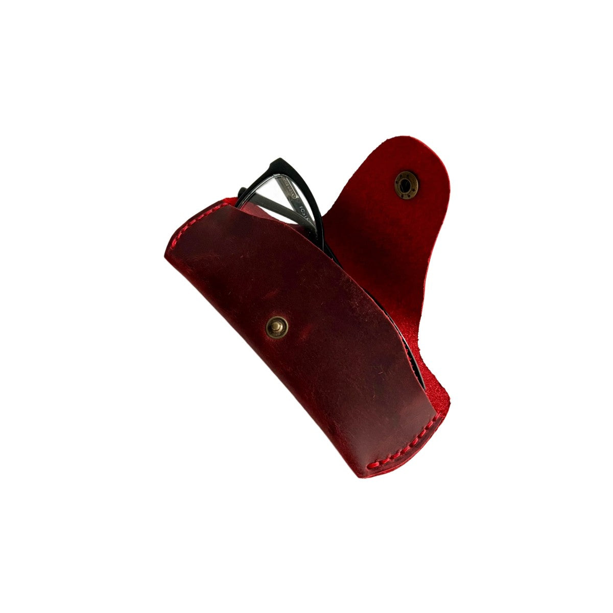 Small Soft Leather Eye Glasses Case in Red, open, angled top view with black-framed eyeglasses inside