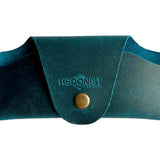 Small Soft Leather Eye Glasses Case in Teal, closed, front view with embossed Hedonist logo and snap closure