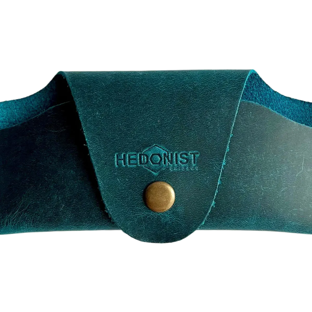 Small Soft Leather Eye Glasses Case in Teal, closed, front view with embossed Hedonist logo and snap closure