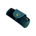 Small Soft Leather Eye Glasses Case in Teal, angled view with black-framed eyeglasses tucked inside