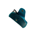 Small Soft Leather Eye Glasses Case in Teal, open, angled top view with black-framed eyeglasses inside