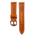 Tan flat leather Apple Watch band packaged for shipping