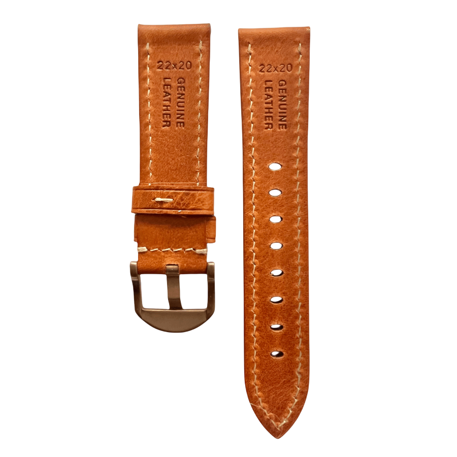 Tan flat leather Apple Watch band packaged for shipping